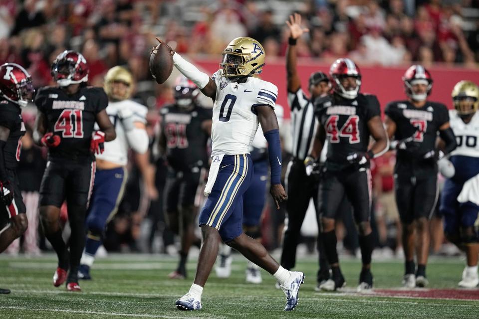 Akron quarterback DJ Irons reacts after picking up a first down in the first half against Indiana, Saturday, Sept. 23, 2023, in Bloomington.