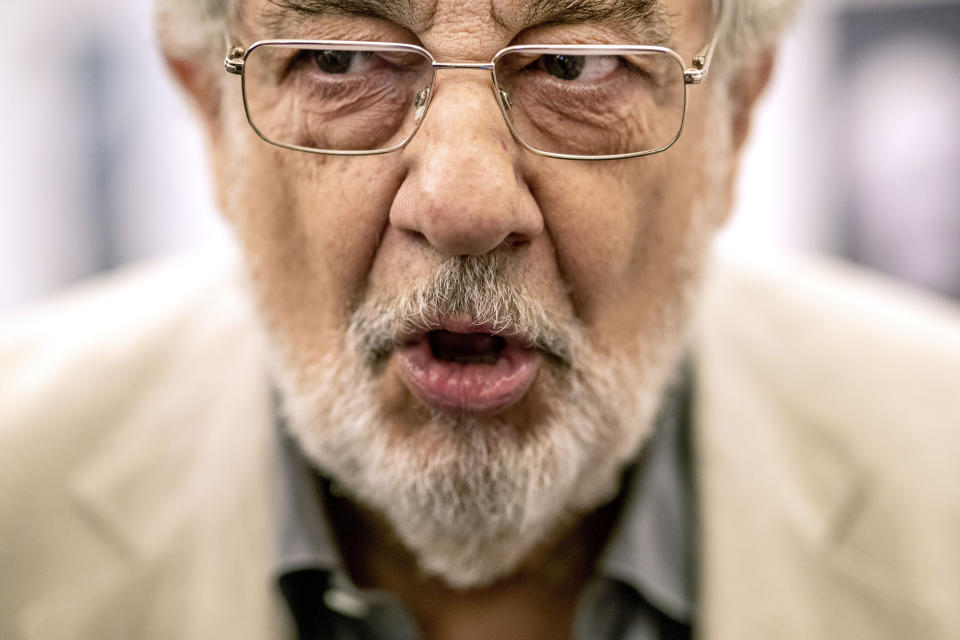 FILE - In this July 12, 2019, file photo, Placido Domingo speaks during a news conference about his upcoming show "Giovanna d'Arco" in Madrid, Spain. Domingo is scheduled to appear onstage at the Salzburg Festival on Aug. 25, 2019, to perform for the first time since multiple women have accused the opera legend of sexual harassment in allegations brought to light by The Associated Press. (AP Photo/Bernat Armangue, File)