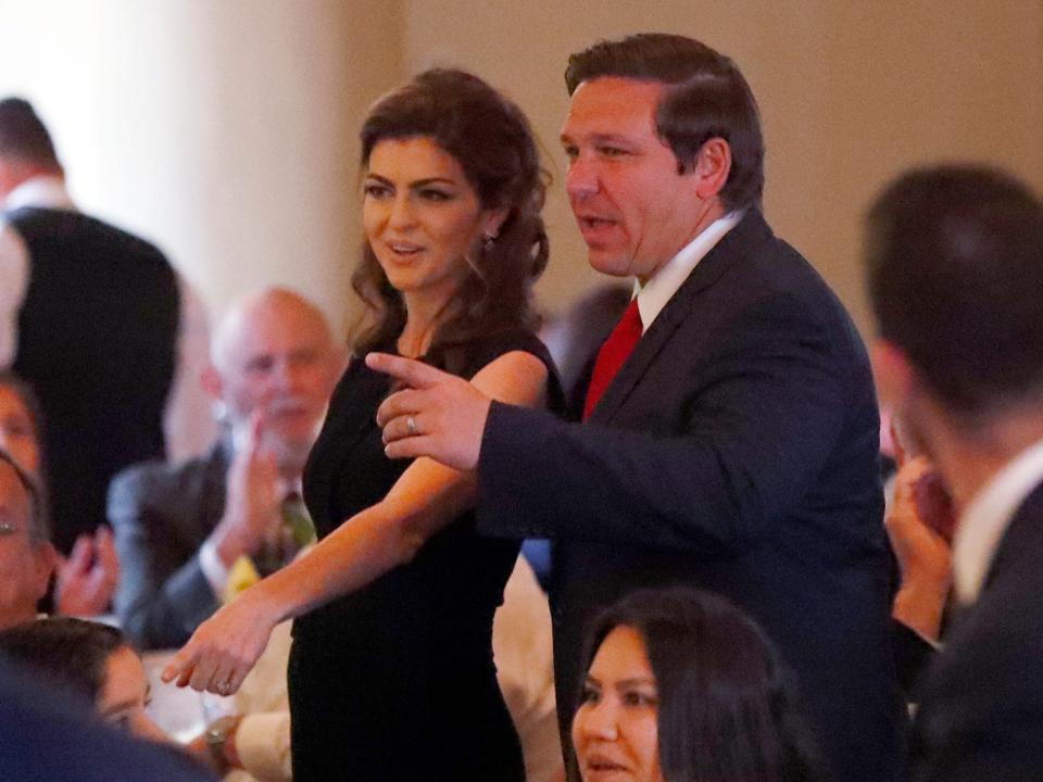 Florida Gov. Ron DeSantis and his wife Casey arrive at the Bay of Pigs Veterans Association luncheon on the 58th anniversary of the United States' failed 1961 invasion of the island, an attempt to overthrow the Cuban government, Wednesday, April 17, 2019, in Coral Gables, Florida.