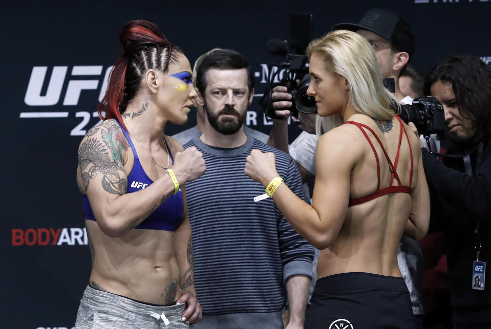 Cris “Cyborg” Justino (L) of Brazil, and Yana Kunitskaya, of Russia, pose during UFC 222 weigh-ins in Las Vegas on Friday, March 2, 2018. (AP)