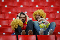 <p>Colombia fans look dejected after losing the penalty shootout. REUTERS/Carl Recine </p>