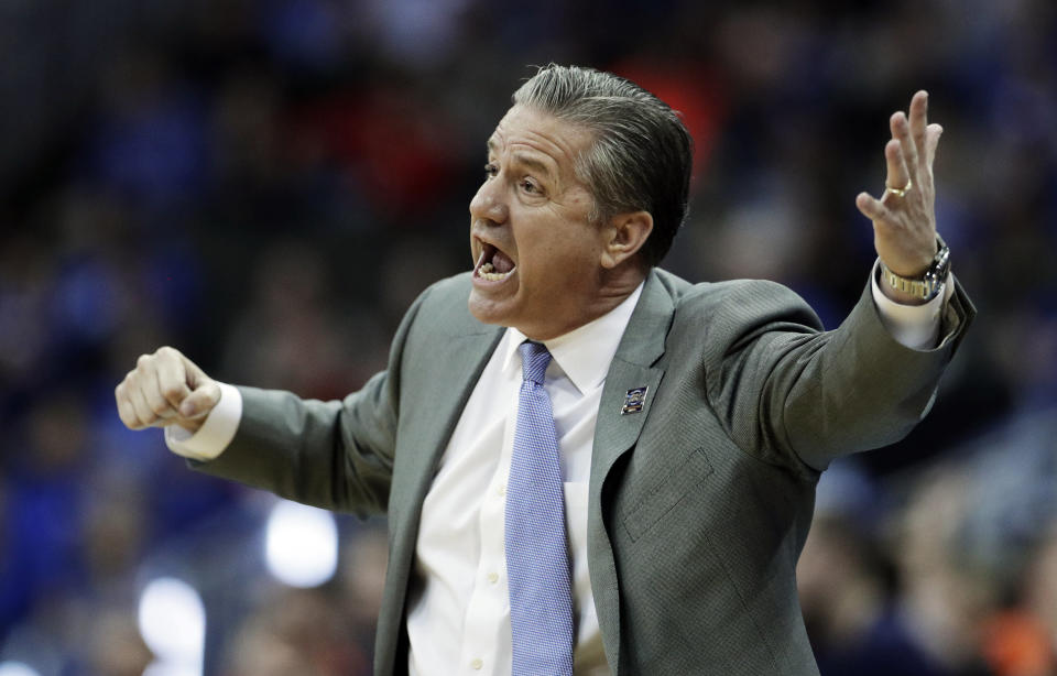 Kentucky head coach John Calipari yells to his players during the first half of the Midwest Regional final game against Auburn in the NCAA men's college basketball tournament Sunday, March 31, 2019, in Kansas City, Mo. (AP Photo/Charlie Riedel)