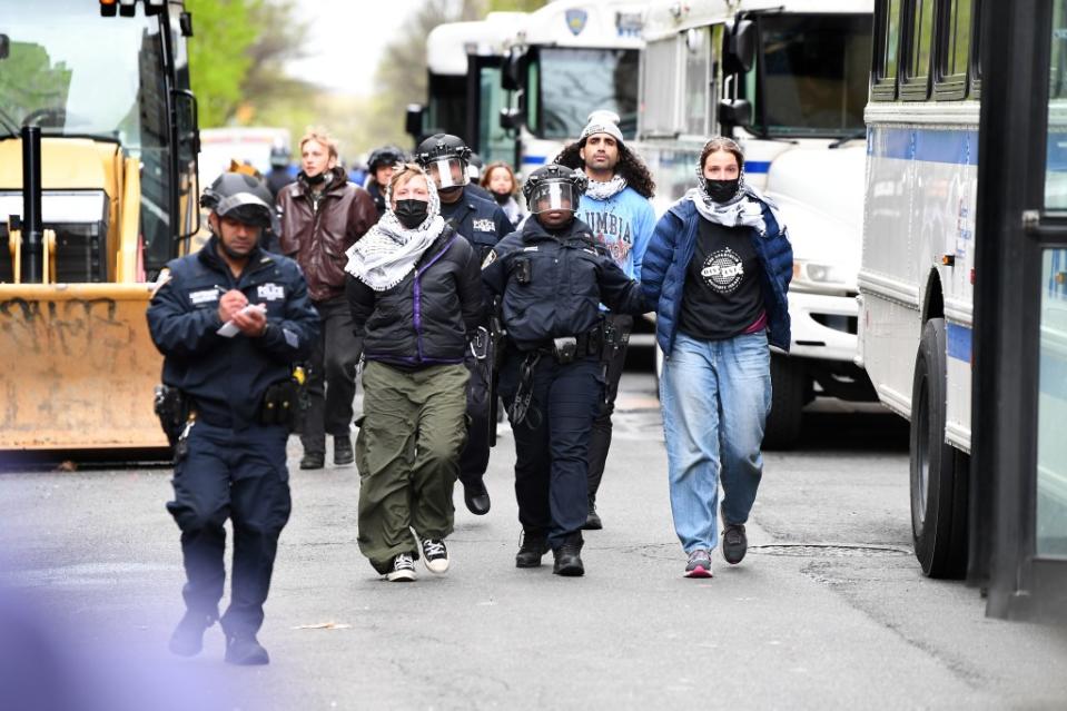 Pro-Palestinian protesters gather as the NYPD loads buses with those arrested last week. Matthew McDermott