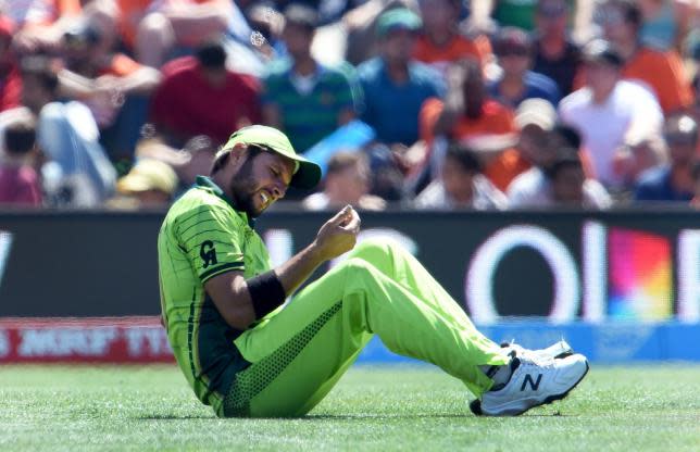 Pakistan fieldsman Shahid Afridi reacts after dropping a catch from a West Indies batsman.