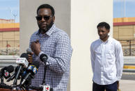 William Benjamin, left, an Aggie Hall of Famer and father of former New Mexico State NCAA college basketball player Deuce Benjamin, right, speaks at a news conference in Las Cruces, N.M., Wednesday, May 3, 2023. The Benjamins and former Aggie player Shak Odunewu discussed the lawsuit they filed alleging teammates ganged up and sexually assaulted them multiple times, while their coaches and others at the school didn't act when confronted with the allegations. (AP Photo/Andres Leighton)