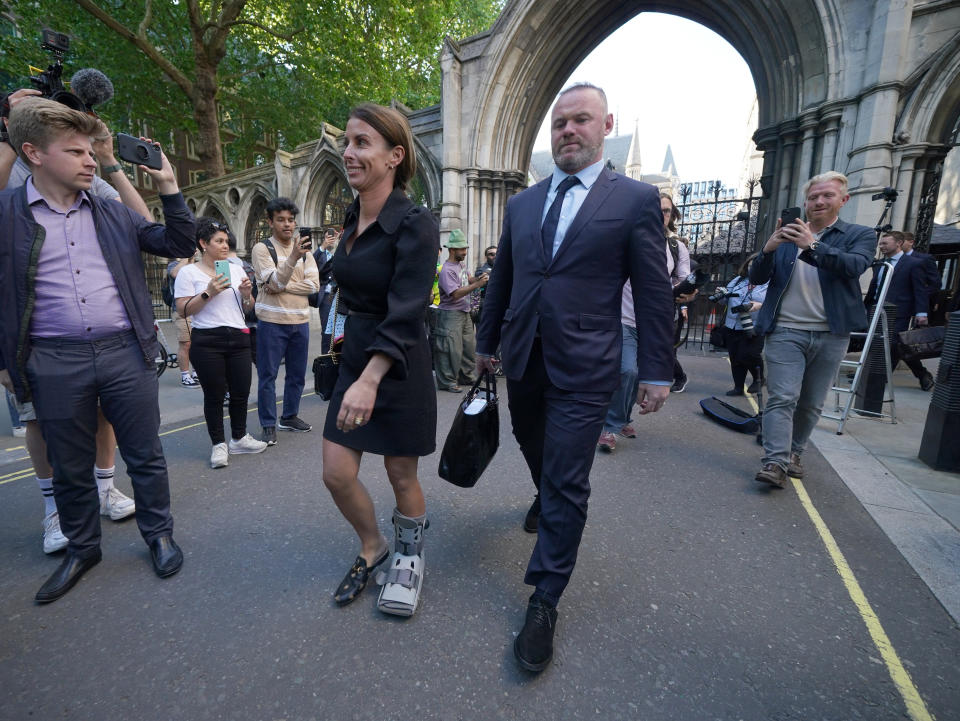 Coleen and Wayne Rooney leaves the Royal Courts Of Justice, London, as the high-profile libel battle between Rebekah Vardy and Coleen Rooney continues. Picture date: Tuesday May 17, 2022.