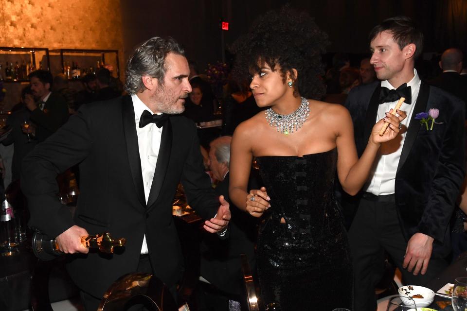 <em>Joker </em>reunion! Costars Joaquin Phoenix and Zazie Beetz catch up at the Governors Ball. Phoenix held onto his Oscar while Beetz held onto a breadstick, so who's the real winner here?