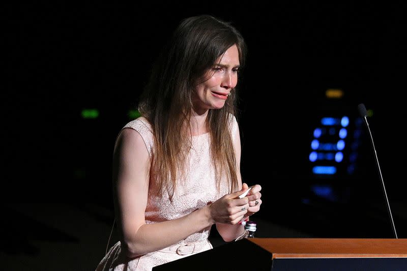 FILE PHOTO: Amanda Knox, who has returned to Italy for the first time since being cleared of the murder of British student Meredith Kercher, cries as she speaks at the Criminal Justice Festival in Modena