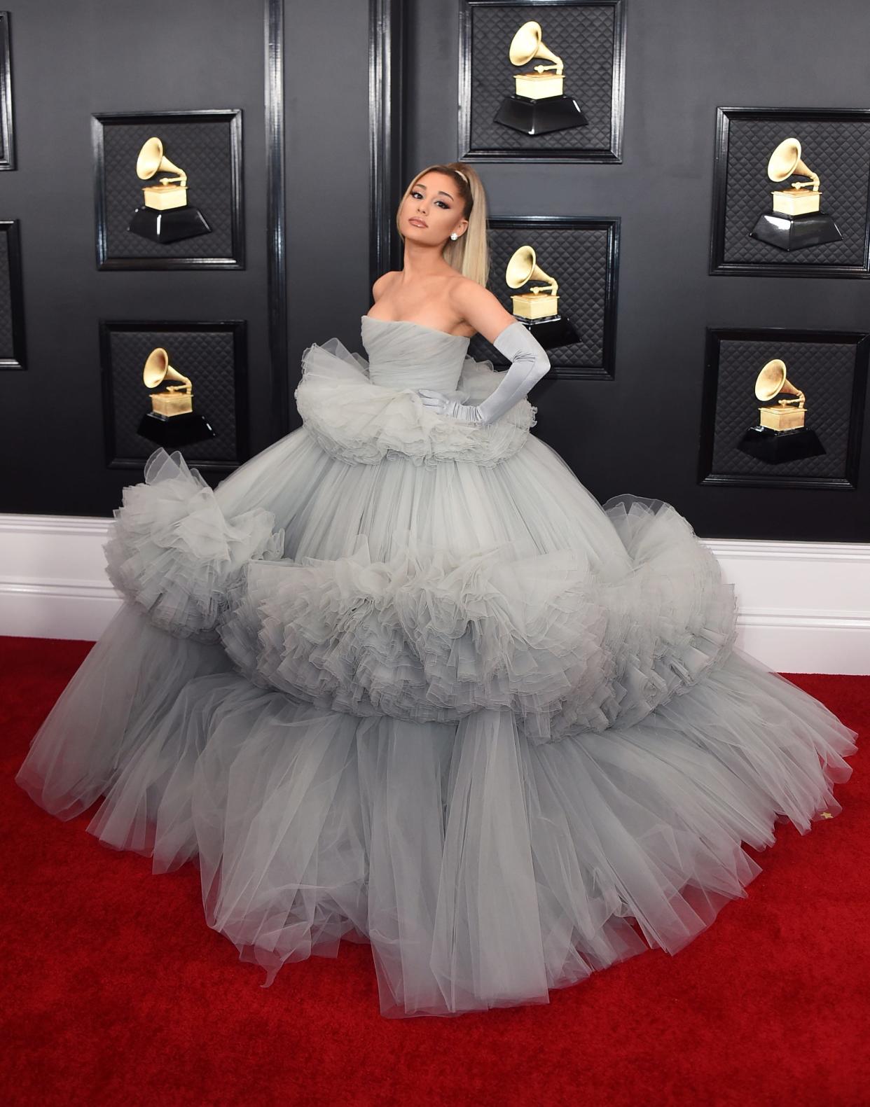 Ariana Grande turned heads in a stunning Giambattista Valli gown. Her look included her signature ponytail and matching gloves.