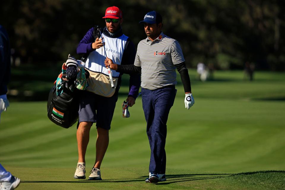 Anirban Lahiri walks down the second fairway of the Players Stadium Course at TPC Sawgrass on Sunday.