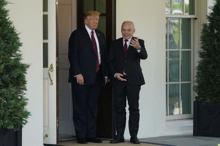 U.S. President Donald Trump stands with Swiss Federal President Ueli Maurer as he arrives for meetings at the White House in Washington, U.S., May 16, 2019. REUTERS/Carlos Barria