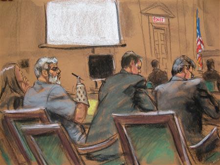 Abu Hamza al-Masir (2nd L), the radical Islamist cleric facing U.S. terrorism charges, wears a prosthetic device as he sits next to defense attorneys Lindsay Lewis (L), Joshua Dratel (2nd R) and Jeremy Schneider in Manhattan federal court in New York in this artist's sketch, April 17, 2014. REUTERS/Jane Rosenberg