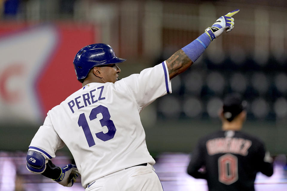 Kansas City Royals' Salvador Perez celebrates after hitting a solo home run during the third inning of a baseball game against the Cleveland Guardians Tuesday, Sept. 6, 2022, in Kansas City, Mo. (AP Photo/Charlie Riedel)