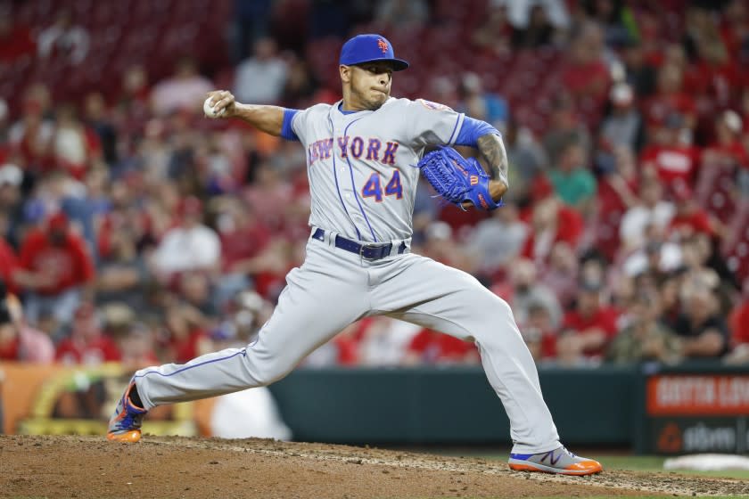 New York Mets relief pitcher AJ Ramos throws in the sixth inning of a baseball game against the Cincinnati Reds, Tuesday, May 8, 2018, in Cincinnati. (AP Photo/John Minchillo)