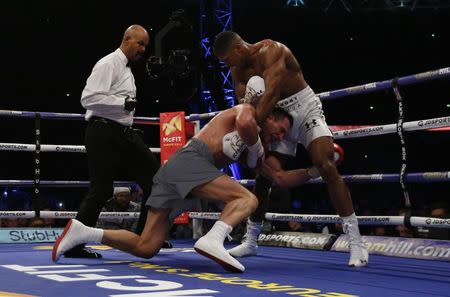 Britain Boxing - Anthony Joshua v Wladimir Klitschko IBF, IBO & WBA Super World Heavyweight Title's - Wembley Stadium, London, England - 29/4/17 Anthony Joshua knocks down Wladimir Klitschko Action Images via Reuters / Andrew Couldridge Livepic