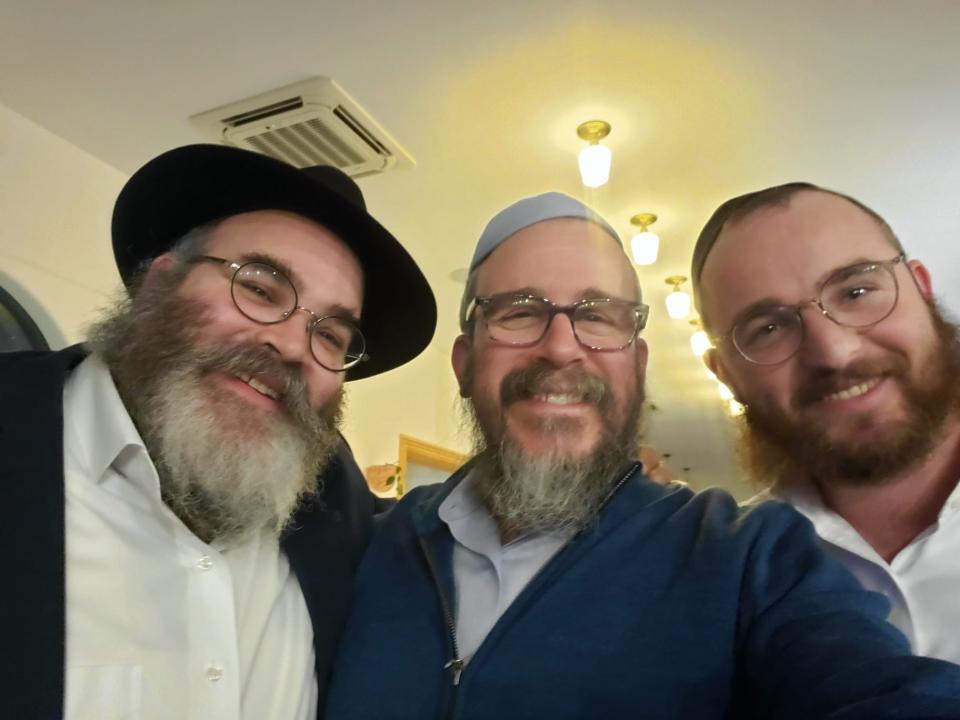 Rabbi Dov Drizin of Valley Chabad in Woodcliff Lake reuniting with his cousins, Rabbi Schneur Segal an emissary in Azerbaijan, and Rabbi Mottel Segal, emissary in Vienna, at the conference for the first time since before the pandemic. 
(Photo: Rabbi Dov Drizin)