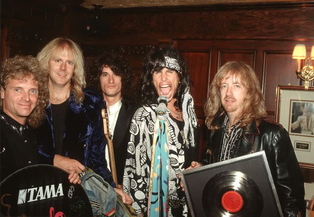 <p>Larry Busacca/Getty </p> Aerosmith in 1989