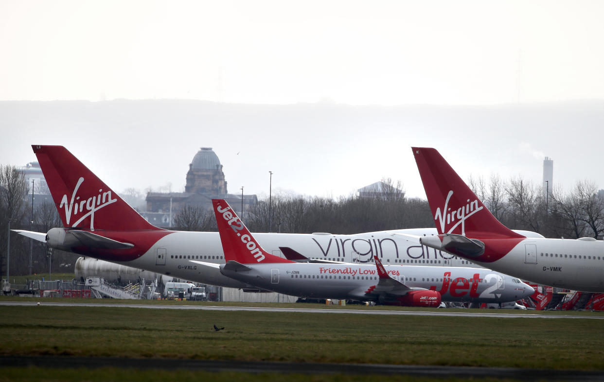 Virgin Atlantic and Jet 2 planes at Glasgow Airport after Prime Minister Boris Johnson has put the UK in lockdown to help curb the spread of the coronavirus. (Photo by Andrew Milligan/PA Images via Getty Images)