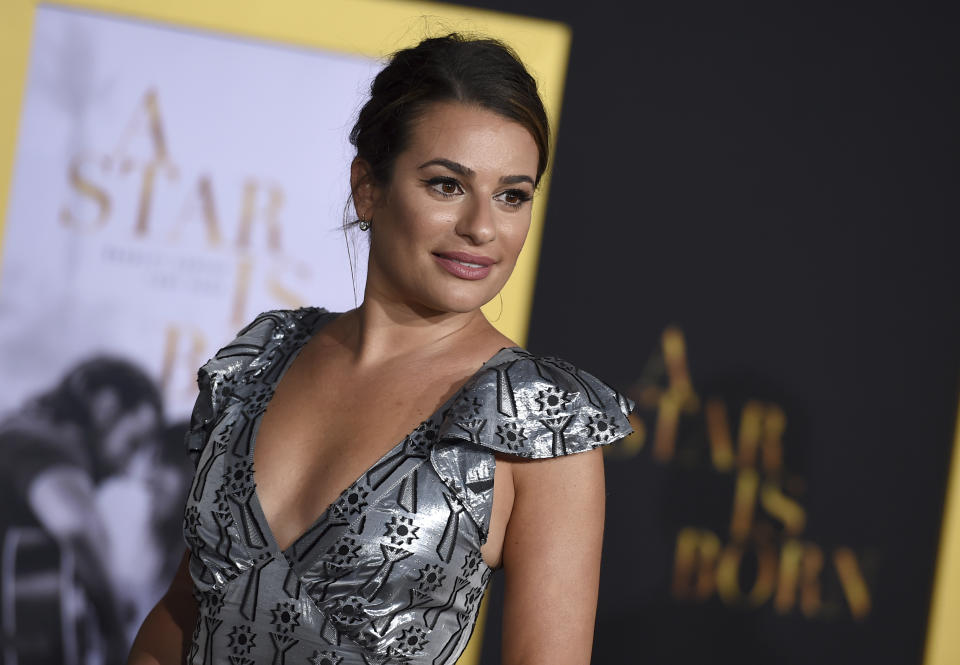 FILE - In this Sept. 24, 2018 file photo, actress Lea Michele arrives at the Los Angeles premiere of "A Star Is Born." Michele has apologized for being “unnecessarily difficult” on the set of the musical TV show "Glee" after a black co-star accused Michele of making her time there “a living hell.” She issued a statement saying that while she didn't recall any incident or judged anyone by their skin color, she was sorry and blamed “immaturity.” (Photo by Jordan Strauss/Invision/AP, File)