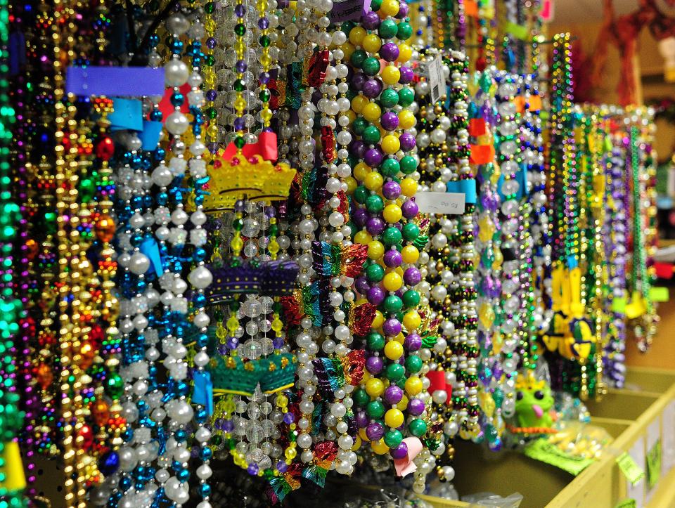 Multiple varieties of Mardi Gras beads are displayed on the walls of Beads Galore in Lafayette, Louisiana, on Feb. 5, 2014.