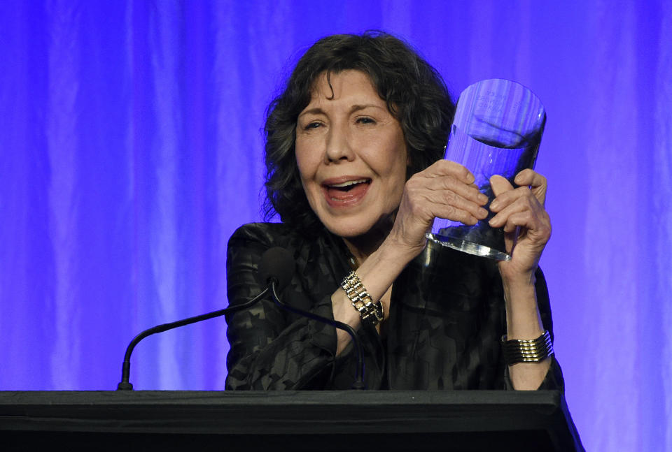 Honoree Lily Tomlin holds her award onstage at "The Paley Honors: A Special Tribute to Television's Comedy Legends" at the Beverly Wilshire Hotel, Thursday, Nov. 21, 2019, in Beverly Hills, Calif. (Photo by Chris Pizzello/Invision/AP)