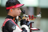 Yang Haoran, of China, competes in the men's 10-meter air rifle at the Asaka Shooting Range in the 2020 Summer Olympics, Sunday, July 25, 2021, in Tokyo, Japan. (AP Photo/Alex Brandon)