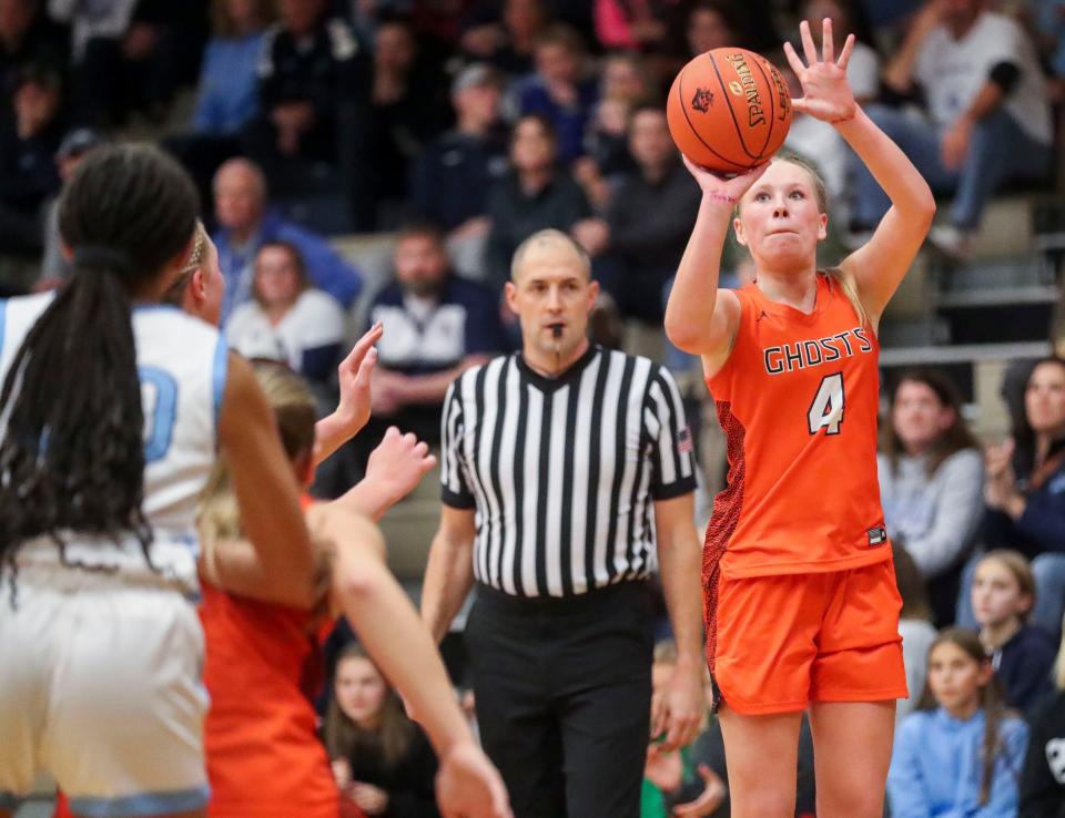 Kaukauna's Addison Baumgart (4) shoots a 3-pointer against Bay Port on Nov. 21.