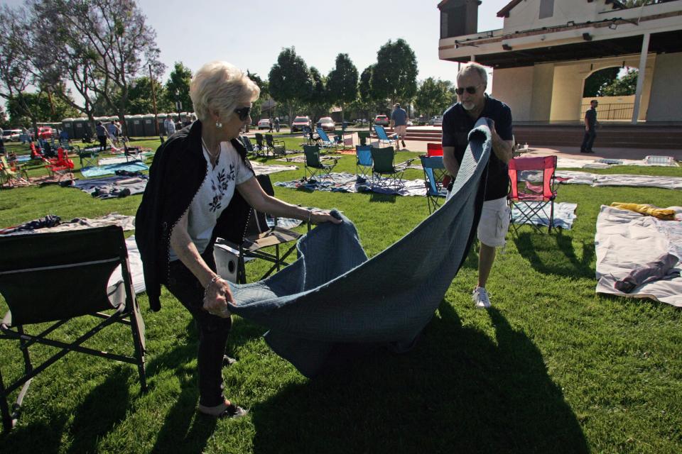 Judi McKay and her husband, Clark, set up their seating area at a 2019 concert at Constitution Park in Camarillo. Saving seats for the concerts is a Camarillo tradition.