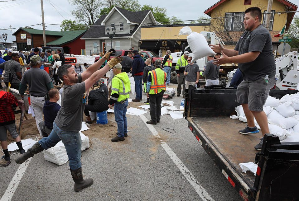 People working with sandbags