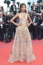 <p>The British model donned a nude Elie Saab dress, adorned with floral embellishments. <br><i>[Photo: Getty]</i> </p>