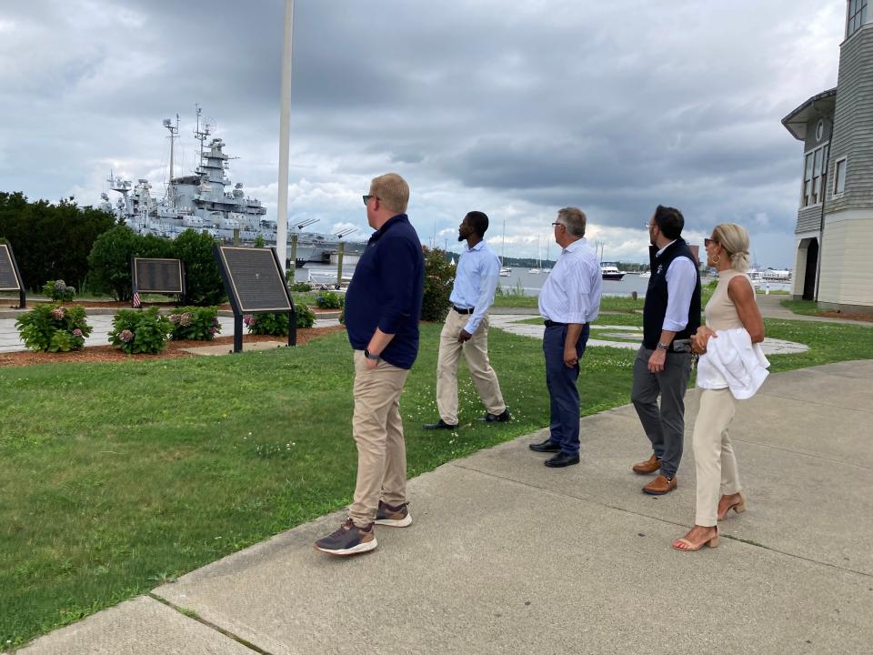 New Department of Conservation and Recreation Commissioner Brian Arrigo gets a tour of Battleship Cove in Fall River from local legislators on Tuesday, Aug. 8, 2023.