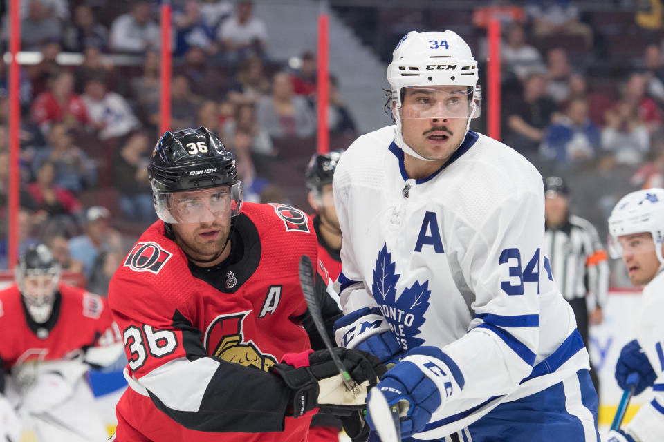 Sep 18, 2019; Ottawa, Ontario, CAN; Ottawa Senators center Colin White (36) faces off against Toronto Maple Leafs center Auston Matthews (34) in the first period at the Canadian Tire Centre. Mandatory Credit: Marc DesRosiers-USA TODAY Sports