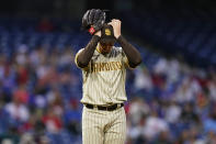 San Diego Padres pitcher Blake Snell adjusts his hat during the fourth inning of a baseball game against the Philadelphia Phillies, Wednesday, May 18, 2022, in Philadelphia. (AP Photo/Matt Slocum)