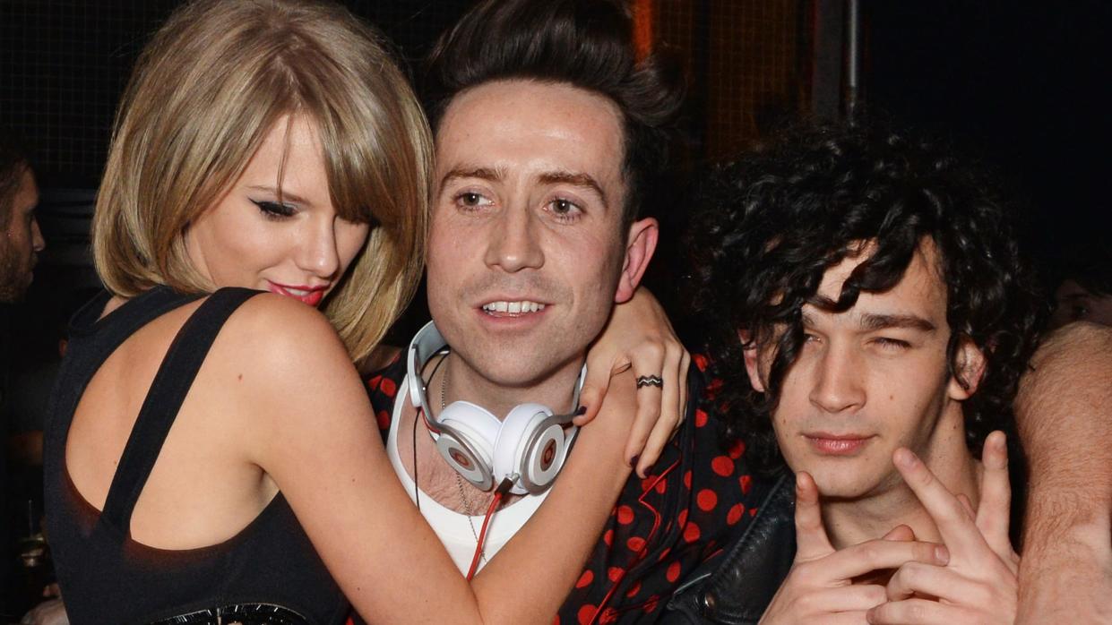 Taylor Swift, Nick Grimshaw and Matt Healy attend the Universal Music Brits party hosted by Bacardi at The Soho House Pop-Up on February 25, 2015 in London, England.  (Photo by David M. Benett/Getty Images for Soho House & Bacardi)