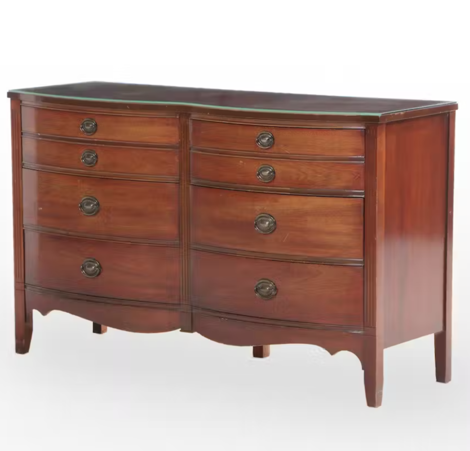 <p><a href="https://www.ebth.com/items/13632338-dixie-furniture-federal-style-mahogany-six-drawer-serpentine-chest" rel="nofollow noopener" target="_blank" data-ylk="slk:Shop Now;elm:context_link;itc:0;sec:content-canvas" class="link ">Shop Now</a></p><p>Dixie Furniture Federal Style Mahogany Six-Drawer Serpentine Chest</p>