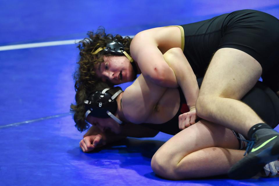 Eddie Terreri of Paramus Catholic is on his way to defeat Ethan Mendel of Northern Highlands in the 175 pound match of their quarter final during the Bergen County Wrestling Tournament Day 2 at Hackensack High School in Hackensack on Sunday, January 23rd, 2022.  