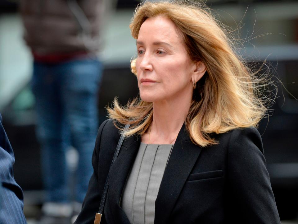 Felicity Huffman arrives at a court hearing in Boston, Massachusetts, on 13 May 2019 (JOSEPH PREZIOSO/AFP via Getty Images)