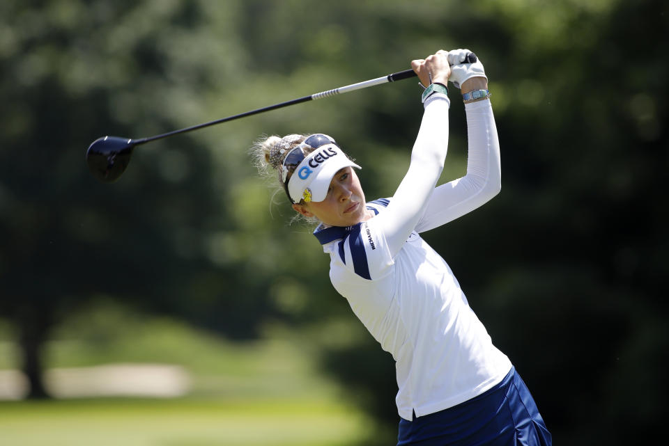 Nelly Korda hits a tee shot on the 14th hole during the final round of the Meijer LPA Classic golf tournament, Sunday, June 20, 2021, in Grand Rapids, Mich. (AP Photo/Al Goldis)