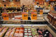 Impossible Foods plant-based beef products are seen among other meat products inside a refrigerator at a supermarket in Hong Kong