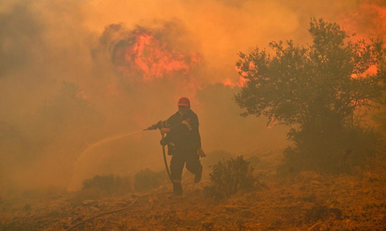 <span>A wildfire in Greece last year. A 2050 simulation showed a cooling operation off the US west coast would increase heat stress around the world.</span><span>Photograph: AFP/Getty Images</span>