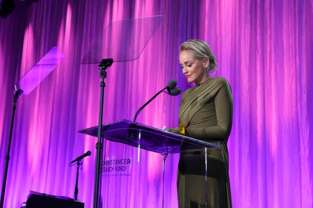Sharon Stone tearfully encouraged a crowd to donate to the Women’s Cancer Research Fund on Thursday, while describing what she said were her financial losses in 