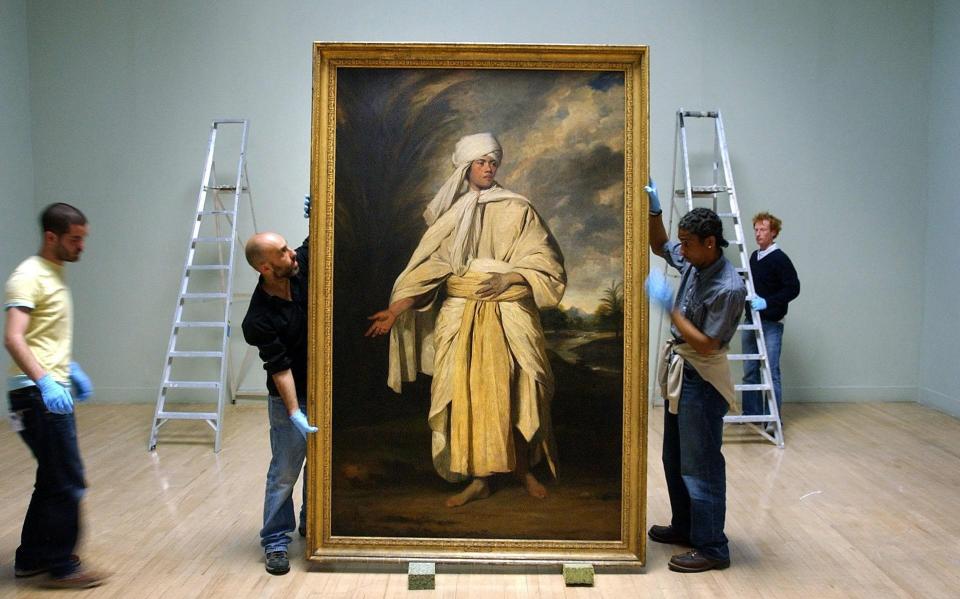 Joshua Reynolds's Portrait of Omai being moved in 2005; it may soon leave the UK - PA