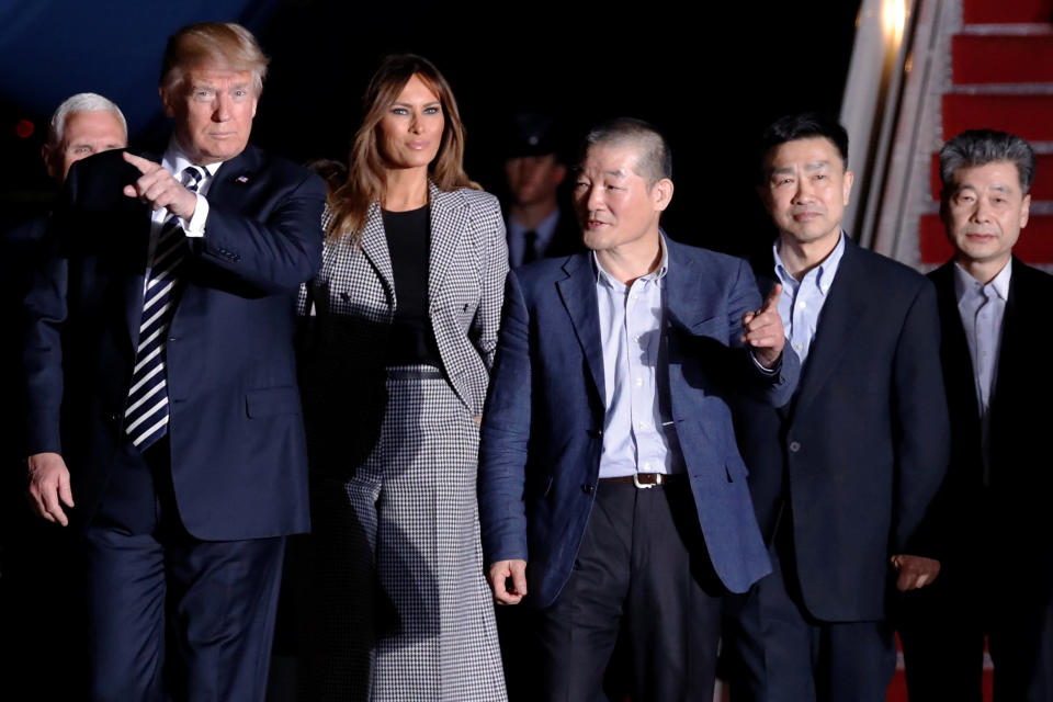 Trump and first lady Melania Trump meet the three Americans released from detention in North Korea upon their arrival at Joint Base Andrews, Maryland. (Photo: Jonathan Ernst / Reuters)