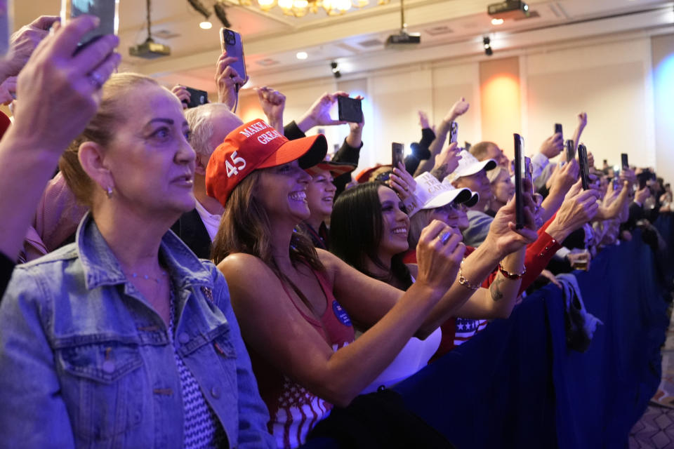 Supporters watch as Republican presidential candidate former President Donald Trump speaks at a caucus night rally in Las Vegas, Thursday, Feb. 8, 2024. (AP Photo/Alex Brandon)
