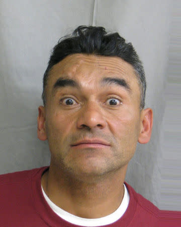 Ramon Escobar, 47, appears in a booking photo provided by the Harris County Sheriff's Office in Houston, Texas, U.S., September 27, 2018. Harris County Sheriff's Office/Handout via REUTERS