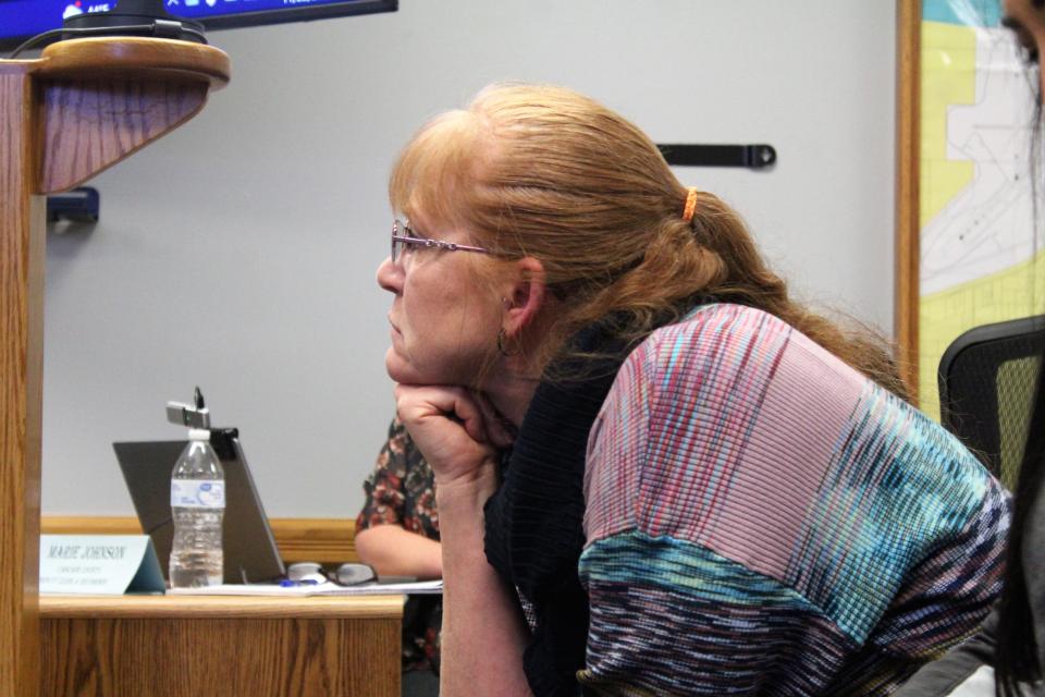 Cascade County Clerk and Recorder, Rina Fontana-Moore, listens intently to deliberations regarding her application for an election recount