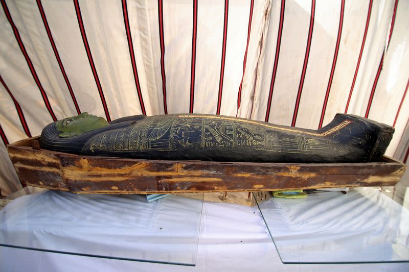 A coffin, part of a recent discovery from the Saqqara necropolis, is seen south of Cairo