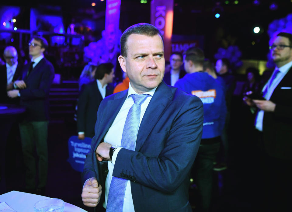 Chairman of National Coalition Party Petteri Orpo, gestures, at the parliamentary election party in Helsinki, Sunday, April 14, 2019. Voters in Finland are casting ballots in a parliamentary election Sunday after climate change dominated the campaign, even overshadowing topics like reforming the nation's generous welfare model. (Jussi Nukariaa/Lehtikuva via AP)