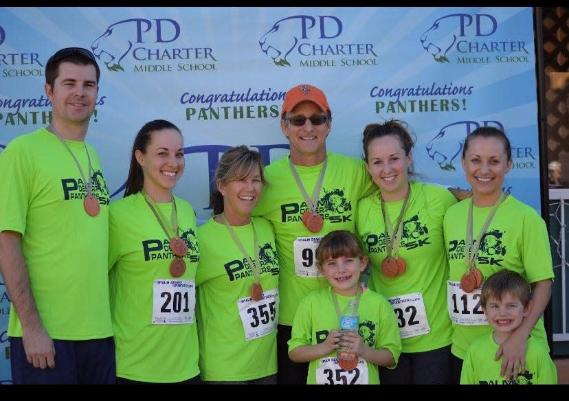 Jeff Montgomery, Mindy Montgomery, Debbi Geyer, Chris Geyer, Kaia Garvey, Kristin Colucci, Kate Albright and Haven Garvey take part in the Panther 5K, benefiting Palm Desert Middle School.