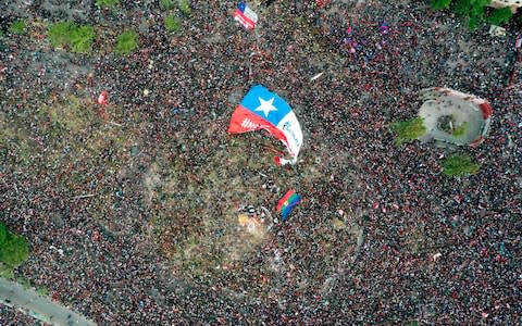 More than a million Chileans took to the streets of Santiago - in a country of just 18 million - Credit: AFP